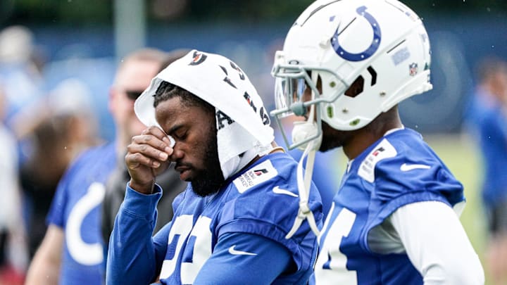 Kenny More II (23) chats with Isaiah Rodgers (34) during the Indianapolis Colts mandatory mini