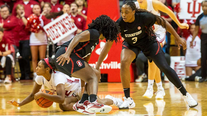 Indiana's Chloe Moore-McNeil (22) jumps on a loose ball during the Indiana versus Stanford women's basketball game at Simon Skjodt Assembly Hall on Sunday, Nov. 17, 2024. Indiana's Chloe Moore-McNeil (22) jumps on a loose ball during the Indiana versus Stanford women's basketball game at Simon Skjodt Assembly Hall on Sunday, Nov. 17, 2024.
