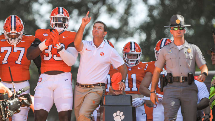 Sep 23, 2023; Clemson, South Carolina, USA; Clemson Tigers head coach Dabo Swinney gets ready to run down the hill with the team before kickoff against the Florida State Seminoles at Memorial Stadium. Sep 23, 2023; Clemson, South Carolina, USA; Clemson Tigers head coach Dabo Swinney gets ready to run down the hill with the team before kickoff against the Florida State Seminoles at Memorial Stadium.