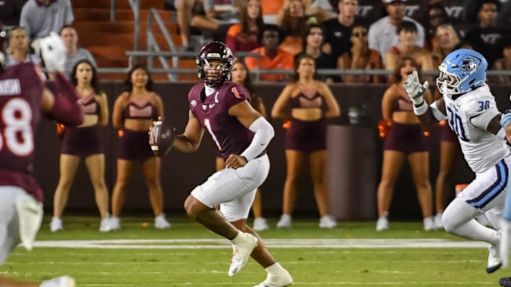 Sep 13, 2025; Blacksburg, Va.; Virginia Tech quarterback Kyron Drones (1) looks to pass during the second quarter.