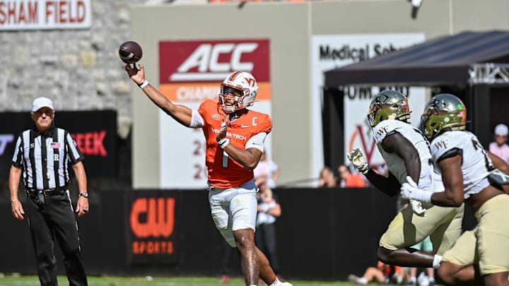 Oct 4, 2025; Blacksburg, Virginia, USA; Virginia Tech Hokies quarterback Kyron Drones (1) throws a pass against the Wake Forest Demon Deacons during the second quarter at Lane Stadium. Mandatory Credit: Brian Bishop-Imagn Images Oct 4, 2025; Blacksburg, Virginia, USA; Virginia Tech Hokies quarterback Kyron Drones (1) throws a pass against the Wake Forest Demon Deacons during the second quarter at Lane Stadium. Mandatory Credit: Brian Bishop-Imagn Images