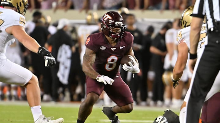 Sep 6, 2025; Blacksburg, Virginia, USA; Virginia Tech Hokies running back Terion Stewart (8) runs the ball during the second quarter at Lane Stadium. Mandatory Credit: Brian Bishop-Imagn Images