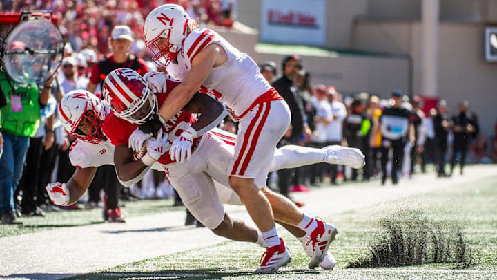 Indiana's Josh Sanguinetti (19) is tackled during the Indiana versus Nebraska football game at Memorial Stadium on Saturday, Oct. 19, 2024.