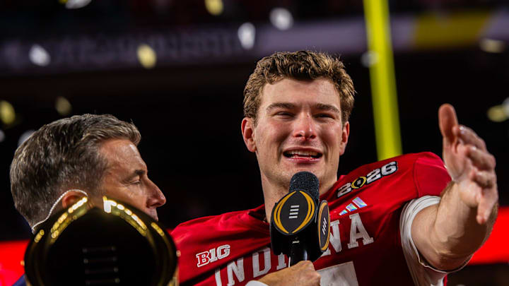 Indiana's Fernando Mendoza (15) talks to the crowd on the podium after the College Football Playoff National Championship.
