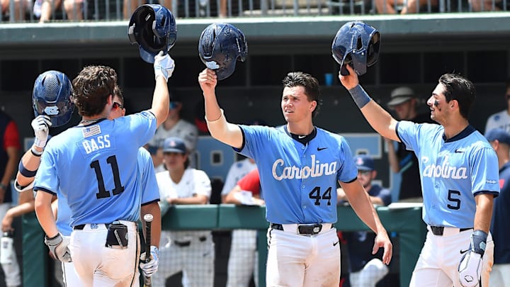 Gavin Gallaher (5) and catcher Luke Stevenson (44) celebrate the two-run homer batted by Tyson Bass (11) against Arizona in the seventh inning. The North Carolina Tarheels and the Arizona Wildcats met in game two of the NCAA Division 1 Super Regionals in Chapel Hill, N.C. on June 7, 2025.