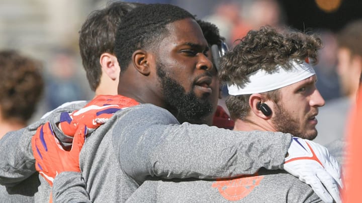 Clemson Tigers running back Phil Mafah  and running backs gather before a game against the Notre Dame Fighting Irish 