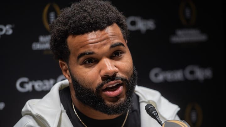University of Miami's Akheem Mesidor talks during Media Day during the College Football Playoffs.