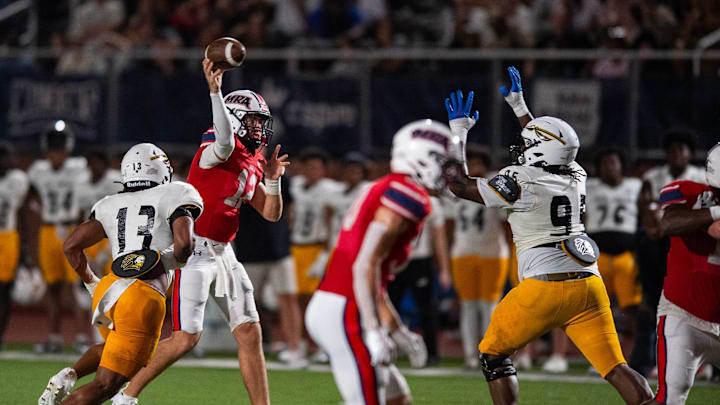 Madison-Ridgeland Academy Patriots' quarterback Samuel Stockett (12) throws the ball during the game against the Oak Grove Warriors in Madison, Miss., on Friday, Sept. 20, 2024.