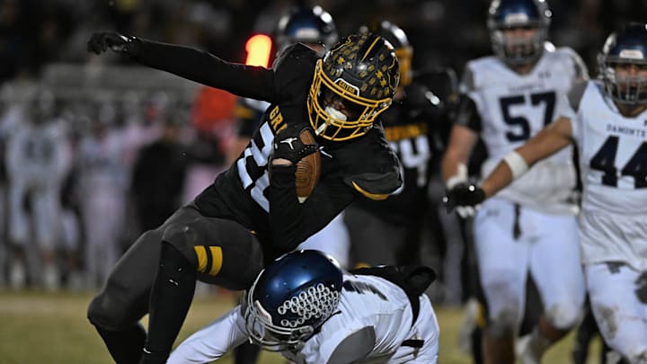 Damonte’s Amari Nash tackles Galena’s Ever Whitaker during Friday’s Division 3 Championship game at Galena High School on Friday Nov. 15, 2024. Galena won 16-13.