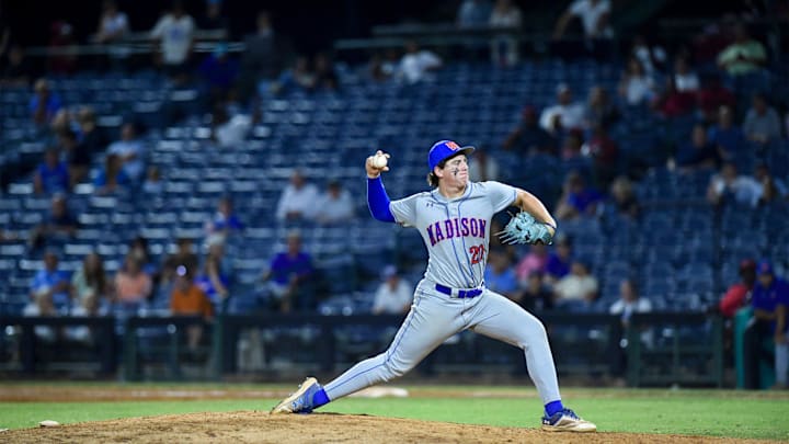 Madison Central Jaguars' Hayden Wilson (20) pitches during the MHSAA 7A baseball championship game two against the Brandon Bulldogs at Trustmark Park in Pearl, Miss., on Friday, May 23, 2025.
