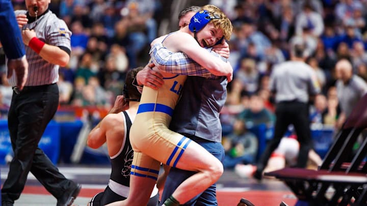 Chestnut Ridge's Dominic Deputy reacts to winning his title match against Faith Christian's Gauge Botero during the PIAA state wrestling championship tournament on March 8 at the Giant Center in Hershey.