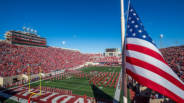 The national anthem is played as the flag is raised before the start of the Indiana versus Washington football game at Memorial Stadium on Oct. 26, 2024.