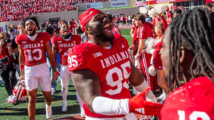 Indiana's Tyrique Tucker (95) celebrates in front of the student section after the Indiana versus Washington football game at Memorial Stadium on Oct. 26, 2024. Indiana's Tyrique Tucker (95) celebrates in front of the student section after the Indiana versus Washington football game at Memorial Stadium on Oct. 26, 2024.