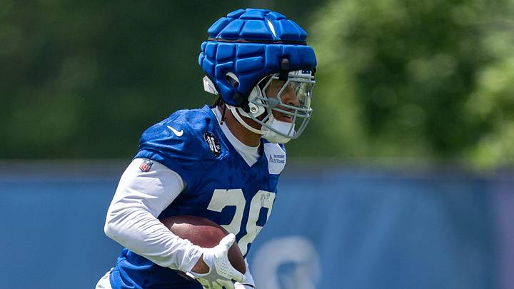 Indianapolis Colts running back Jonathan Taylor (28) takes a handoff down the field Wednesday, June 10, 2026, during minicamp at Indiana Farm Bureau Football Center in Indianapolis.
