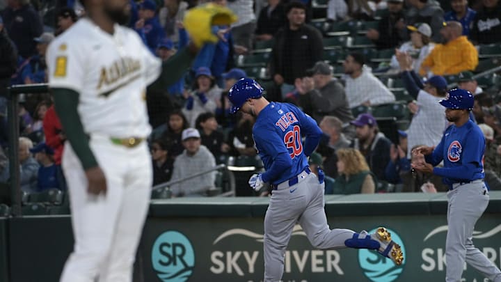 Apr 1, 2025; West Sacramento, California, USA; Chicago Cubs outfielder Kyle Tucker (30) rounds first base after hitting a home run against the Athletics during the second inning at Sutter Health Park. Mandatory Credit: Ed Szczepanski-Imagn Images