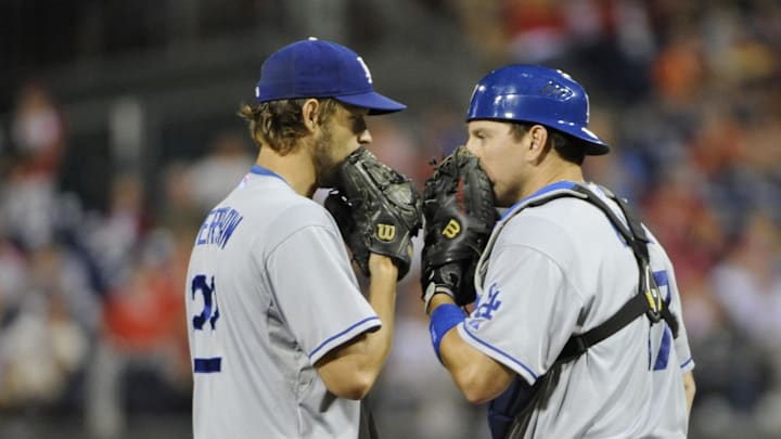 Aug 17, 2013; Philadelphia, PA, USA; Los Angeles Dodgers starting pitcher Clayton Kershaw (22) and  catcher A.J. Ellis (17) talk strategy against the Philadelphia Phillies at Citizens Bank Park. The Dodgers defeated the Phillies, 5-0. Mandatory Credit: Eric Hartline-Imagn Images