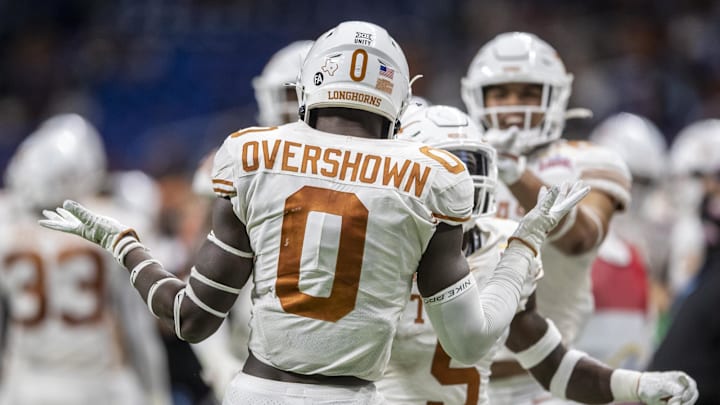 Texas Longhorns linebacker DeMarvion Overshown (0) celebrates a fumble recovery against Colorado Buffaloes