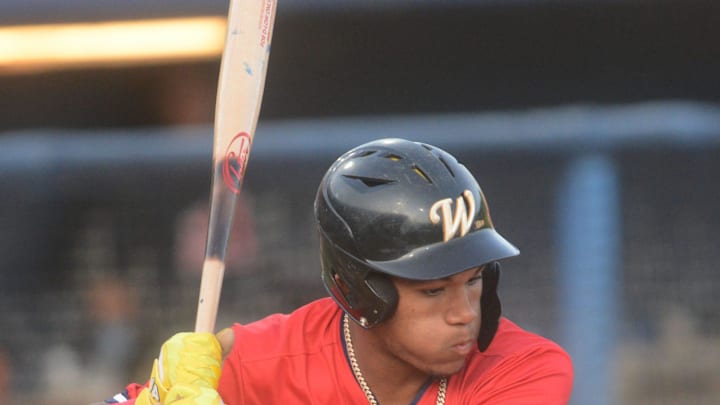 Brockton Rox's D'Angelo Ortiz, son of Red Sox great David Ortiz, looks at a pitch during a game at Dodd Stadium in Norwich, Conn.