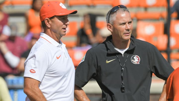 Sep 23, 2023; Clemson, South Carolina, USA; Clemson Tigers head coach Dabo Swinney and Florida State Seminoles head coach Mike Norvell before a game at Memorial Stadium. Mandatory Credit: Ken Ruinard-Imagn Images