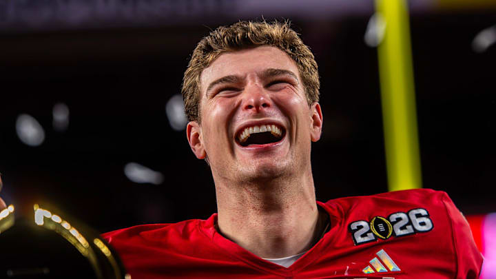 Indiana's Fernando Mendoza (15) smiles on the podium after the College Football Playoff National Championship college football game at Hard Rock Stadium in Miami Gardens on Monday, Jan. 19, 2026.