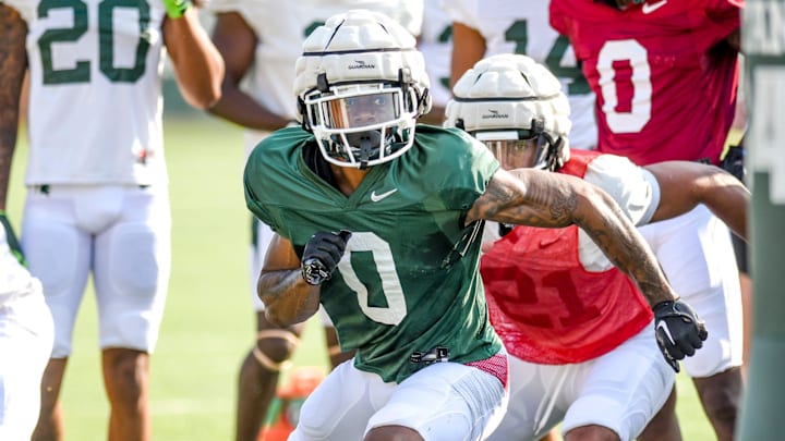 Michigan State receiver Alante Brown runs a drill during football practice on Wednesday, Aug. 9,
