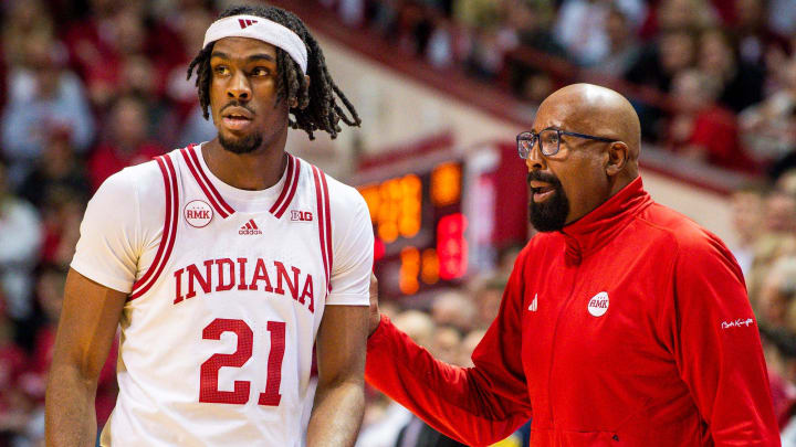 Indiana Head Coach Mike Woodson talks with Mackenzie Mgbako (21).
