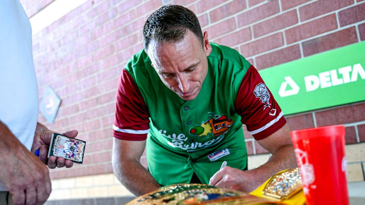 Nathan's Hot Dog Eating champion Joey Chestnut sings autographs before the Lugnuts game against the TinCaps. Nathan's Hot Dog Eating champion Joey Chestnut sings autographs before the Lugnuts game against the TinCaps.