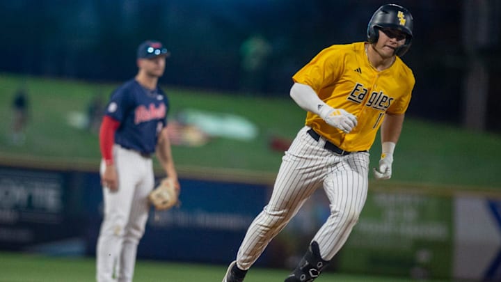 Southern Miss Golden Eagles' Davis Gillespie (11) rounds third base during the game against the Ole Mississippi Rebels at Trustmark Park in Pearl, Miss., on Tuesday, March 18, 2025.