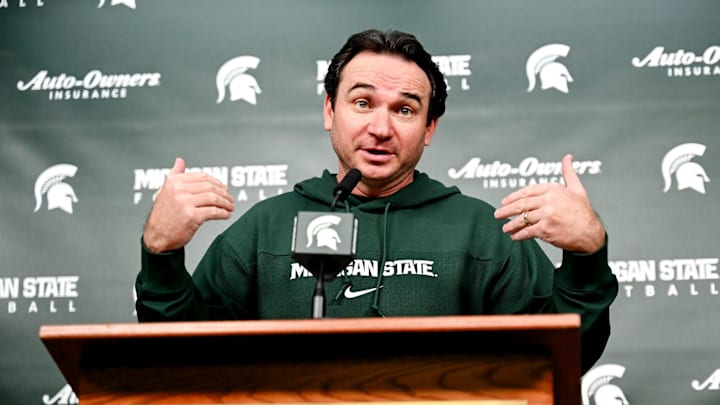 Michigan State coach Jonathan Smith talks the media on the first national signing day for college