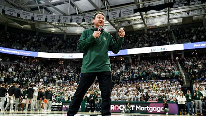 Michigan State's new football coach Jonathan Smith speaks to the crowd during a timeout in the basketball game against Georgia Southern on Tuesday, Nov. 28, 2023, at the Breslin Center in East Lansing.