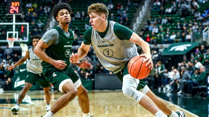 Michigan State's Gehrig Normand, right, moves the ball as Malik Hall defends during an MSU basketball team scrimmage on Saturday, Oct. 21, 2023, at the Breslin Center in East Lansing.