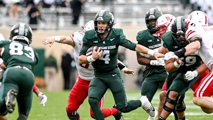 Michigan State's Sam Leavitt runs for a first down against Nebraska during the fourth quarter on Saturday, Nov. 4, 2023, at Spartan Stadium in East Lansing. Michigan State's Sam Leavitt runs for a first down against Nebraska during the fourth quarter on Saturday, Nov. 4, 2023, at Spartan Stadium in East Lansing.
