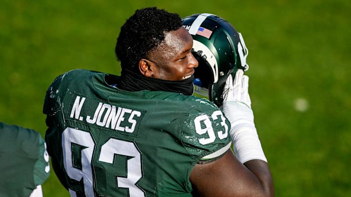 Michigan State's Naquan Jones talks with teammates on the sideline during the third quarter in the game against Indiana on Saturday, Nov. 14, 2020, at Spartan Stadium in East Lansing.

201114 Msu Indiana 162a