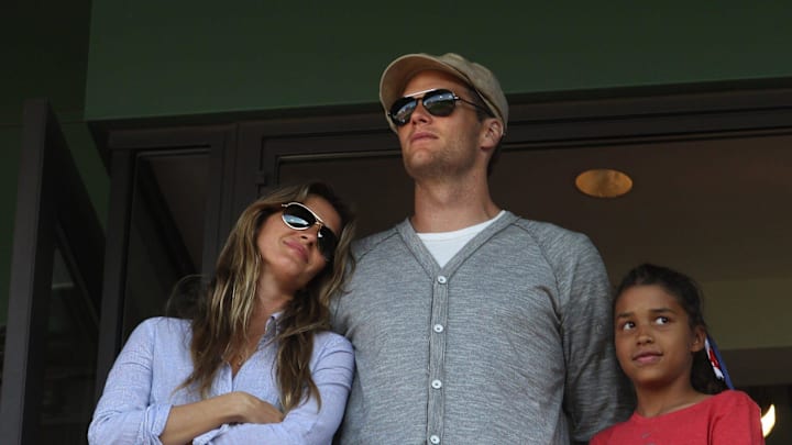 2012: Tom Brady and his wife Gisele Bundchen look out over Fenway during the 7th inning stretch.