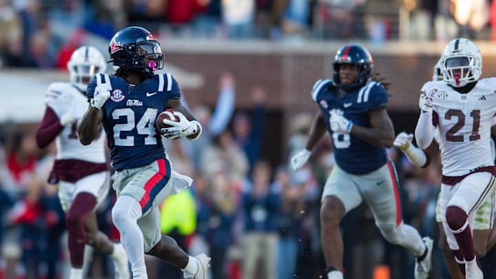 Mississippi's running back Ulysses Bentley IV (24) runs the ball all the way into the end zone and scores a touch down during the Egg Bowl game against Mississippi State at Vaught-Hemingway Stadium on Friday, Nov. 29, 2024.
