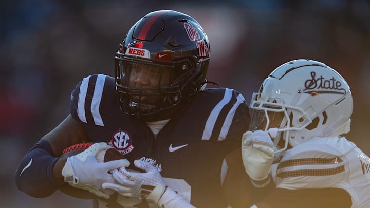 Mississippi's defensive tackle JJ Pegues (38) scores a touchdown during the Egg Bowl game against Mississippi State at Vaught-Hemingway Stadium on Friday, Nov. 29, 2024. Mississippi's defensive tackle JJ Pegues (38) scores a touchdown during the Egg Bowl game against Mississippi State at Vaught-Hemingway Stadium on Friday, Nov. 29, 2024.