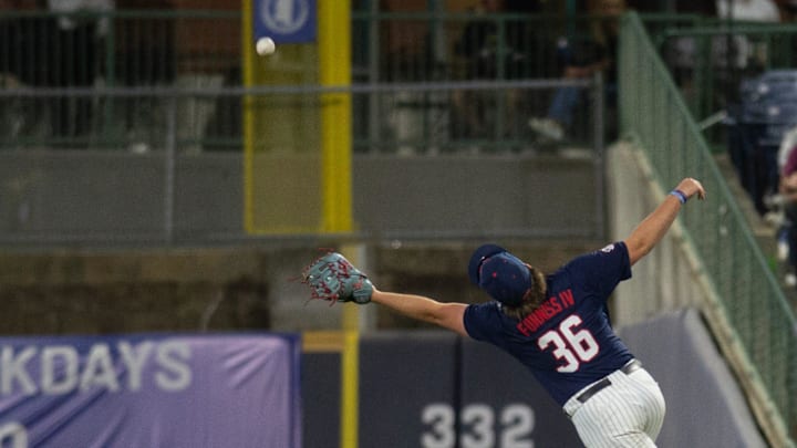 Ole Mississippi Rebels' Will Furniss IV (36) misses the ball in the outfield during the game against the Southern Miss Golden Eagles at Trustmark Park in Pearl, Miss., on Tuesday, March 18, 2025.