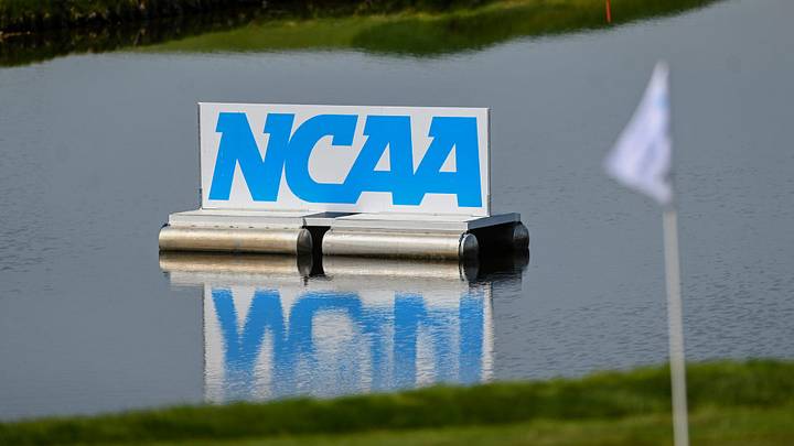A NCAA sign floats in the water during the golf regional.
