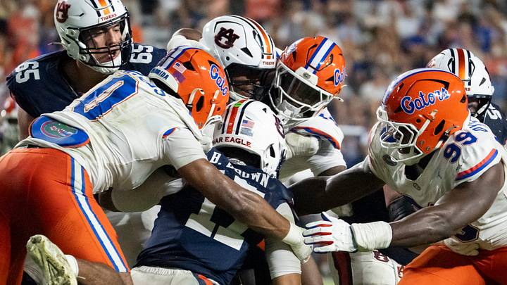 Auburn Tigers quarterback Byrum Brown (17) is sacked as Auburn Tigers take on Florida Gators at Jordan-Hare Stadium in Auburn, Ala. on Saturday, Sept. 19, 2026. Florida Gators defeated Auburn Tigers 44-39.