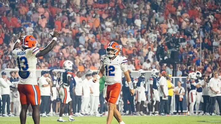 Florida Gators running back Jadan Baugh (13) and quarterback Aaron Philo (12) celebrate a touchdown as Auburn Tigers take on Florida Gators at Jordan-Hare Stadium in Auburn, Ala. on Saturday, Sept. 19, 2026. Florida Gators defeated Auburn Tigers 44-39.