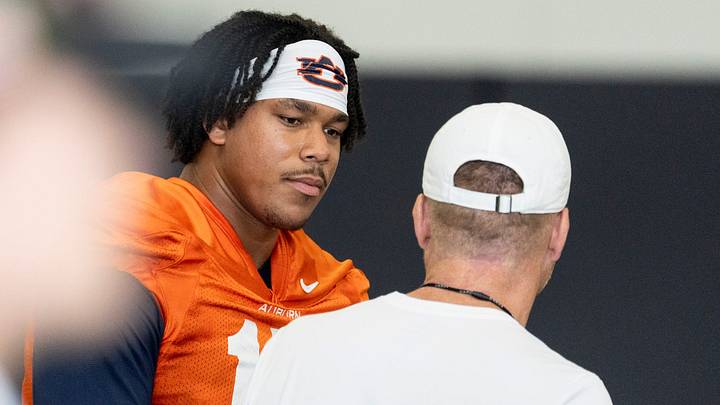 Auburn Tigers quarterback Byrum Brown (17) talks with head coach Alex Golesh during the first day of football practice at the Woltosz Football Performance Center in Auburn, Ala. on Wednesday, Aug. 5, 2026. Auburn Tigers quarterback Byrum Brown (17) talks with head coach Alex Golesh during the first day of football practice at the Woltosz Football Performance Center in Auburn, Ala. on Wednesday, Aug. 5, 2026.