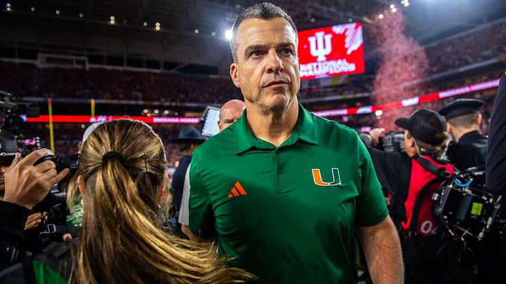 Miami Head Coach Mario Cristobal heads off the field after the College Football Playoff National Championship college football game at Hard Rock Stadium in Miami Gardens on Monday, Jan. 19, 2026. Miami Head Coach Mario Cristobal heads off the field after the College Football Playoff National Championship college football game at Hard Rock Stadium in Miami Gardens on Monday, Jan. 19, 2026.