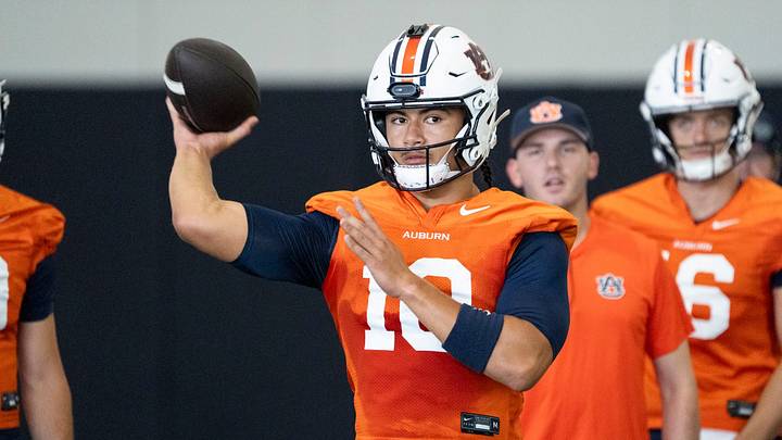 Auburn Tigers quarterback Tristan Ti'a (10) throws the ball during the first day of football practice at the Woltosz Football Performance Center. Auburn Tigers quarterback Tristan Ti'a (10) throws the ball during the first day of football practice at the Woltosz Football Performance Center.