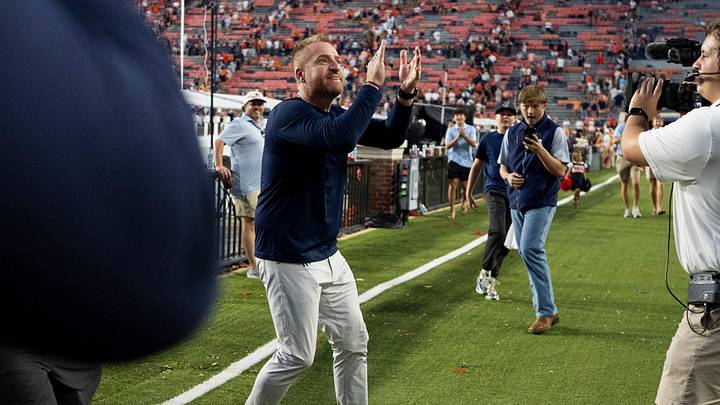 Auburn Tigers head coach Alex Golesh celebrates with fans as Auburn Tigers take on Vanderbilt Commodores at Jordan-Hare Stadium in Auburn, Ala. on Saturday, Sept. 26, 2026. Auburn Tigers defeated Vanderbilt Commodores 21-15.