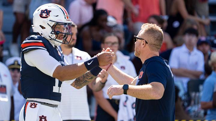 Auburn Tigers quarterback Byrum Brown (17) and head coach Alex Golesh shake hands will need to clean it up offensively if they want to see a bowl game this postseason. Auburn Tigers quarterback Byrum Brown (17) and head coach Alex Golesh shake hands will need to clean it up offensively if they want to see a bowl game this postseason.