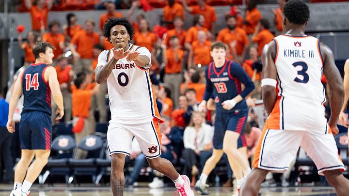 Auburn Tigers guard Tahaad Pettiford (0) celebrates a score as Auburn Tigers takes on Samford Bulldogs at Neville Arena in Auburn, Ala. on Thursday, Oct. 29, 2026. Auburn Tigers lead Samford Bulldogs 35-24 at halftime. Auburn Tigers guard Tahaad Pettiford (0) celebrates a score as Auburn Tigers takes on Samford Bulldogs at Neville Arena in Auburn, Ala. on Thursday, Oct. 29, 2026. Auburn Tigers lead Samford Bulldogs 35-24 at halftime.