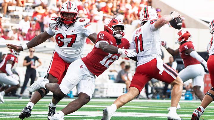 Indiana's Tobi Osunsanmi (12) pursues Western Kentucky's Brock Glenn (11) during the Indiana versus Western Kentucky football game at Memorial Stadium on Saturday, Sept. 19, 2026. Indiana's Tobi Osunsanmi (12) pursues Western Kentucky's Brock Glenn (11) during the Indiana versus Western Kentucky football game at Memorial Stadium on Saturday, Sept. 19, 2026.