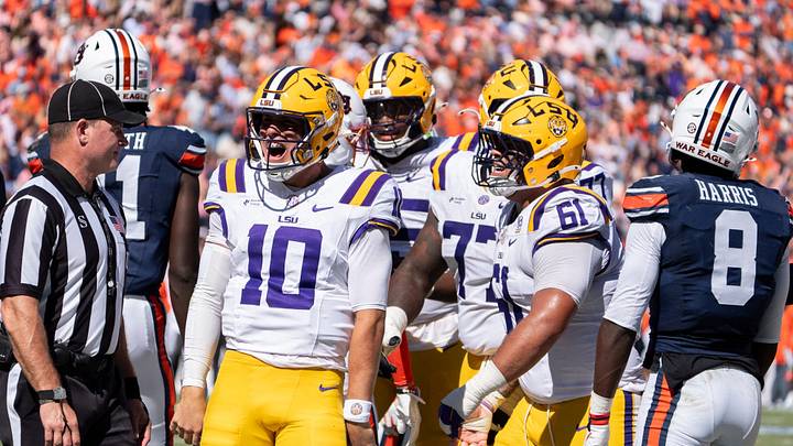 LSU Tigers quarterback Sam Leavitt (10) celebrates his touchdown run as Auburn Tigers take on LSU Tigers at Jordan-Hare Stadium in Auburn, Ala. on Saturday, Oct. 24, 2026. LSU Tigers lead Auburn Tigers 31-10 at halftime. LSU Tigers quarterback Sam Leavitt (10) celebrates his touchdown run as Auburn Tigers take on LSU Tigers at Jordan-Hare Stadium in Auburn, Ala. on Saturday, Oct. 24, 2026. LSU Tigers lead Auburn Tigers 31-10 at halftime.