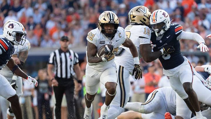 Vanderbilt Commodores running back Makhilyn Young (22) runs the ball as Auburn Tigers take on Vanderbilt Commodores at Jordan-Hare Stadium in Auburn, Ala. on Saturday, Sept. 26, 2026. Auburn Tigers defeated Vanderbilt Commodores 21-15. Vanderbilt Commodores running back Makhilyn Young (22) runs the ball as Auburn Tigers take on Vanderbilt Commodores at Jordan-Hare Stadium in Auburn, Ala. on Saturday, Sept. 26, 2026. Auburn Tigers defeated Vanderbilt Commodores 21-15.