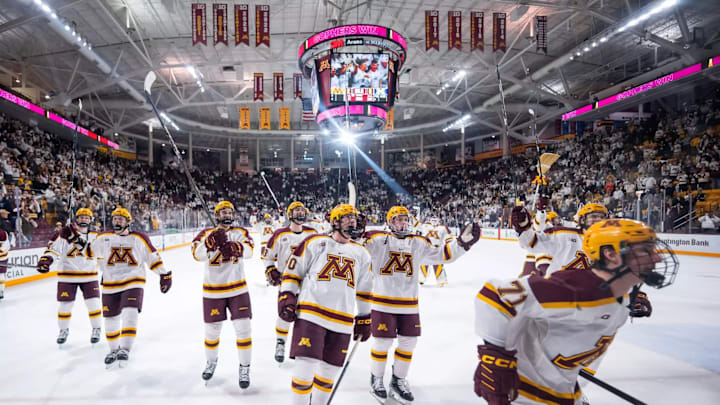 Gophers hockey celebrates after a shutout win over Michigan. 